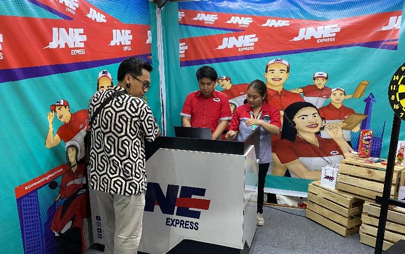 Suasana store JNE di PICA Fest 2025. (balihotnews/ist).